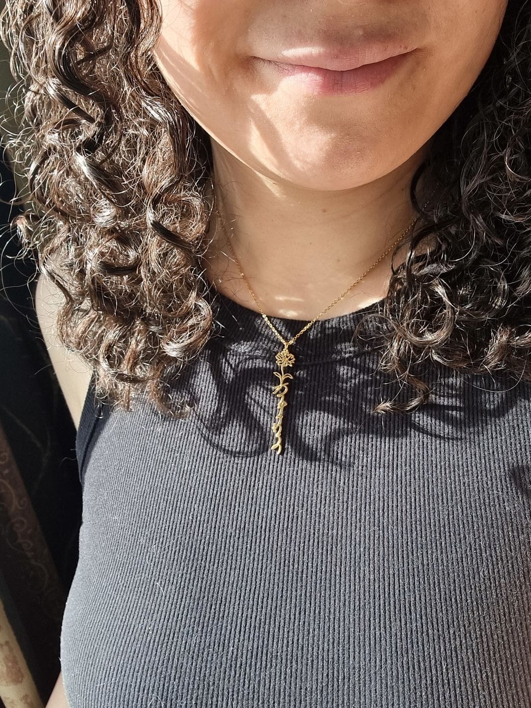 Customer photo review of Custom birth flower name necklace
