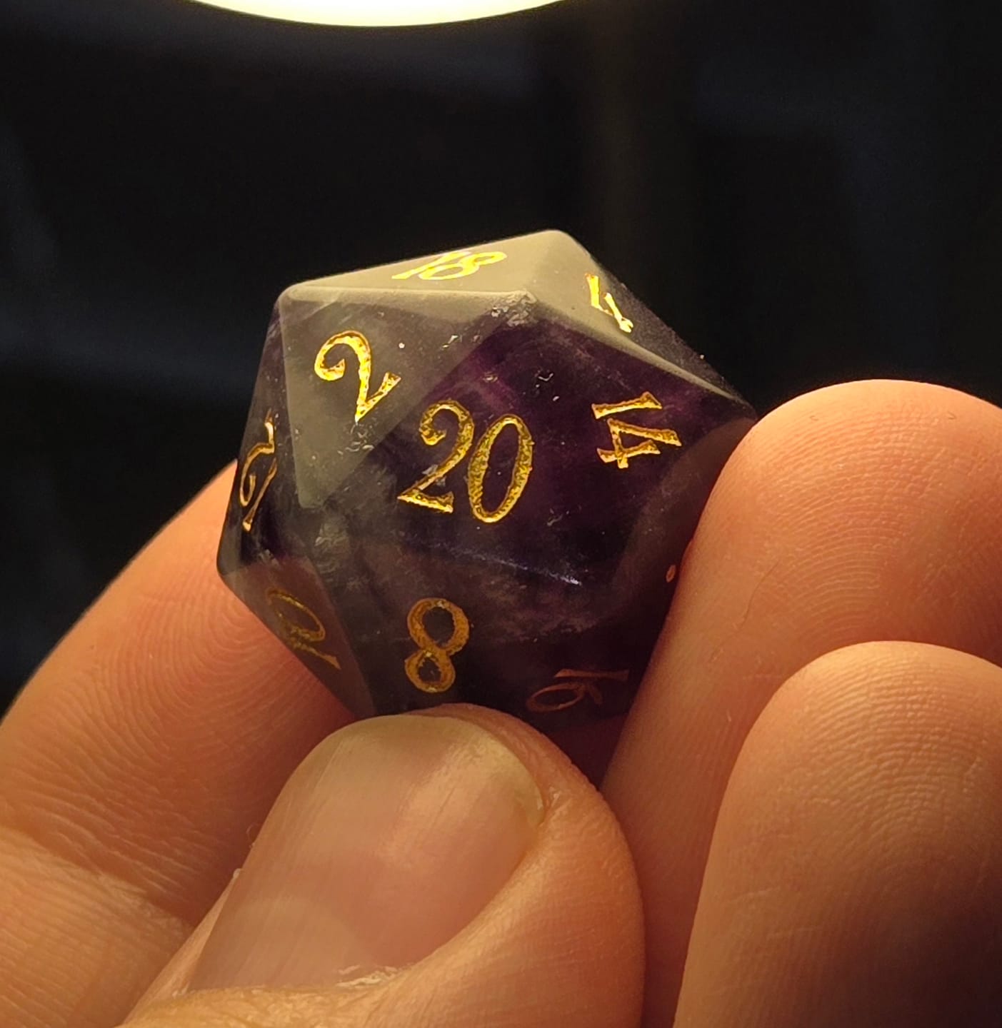 Customer photo review of URWizards D20 Engraved Purple Fluorite Gemstone D20 Dice - Dungeons and Dragons D20, RPG Game DND