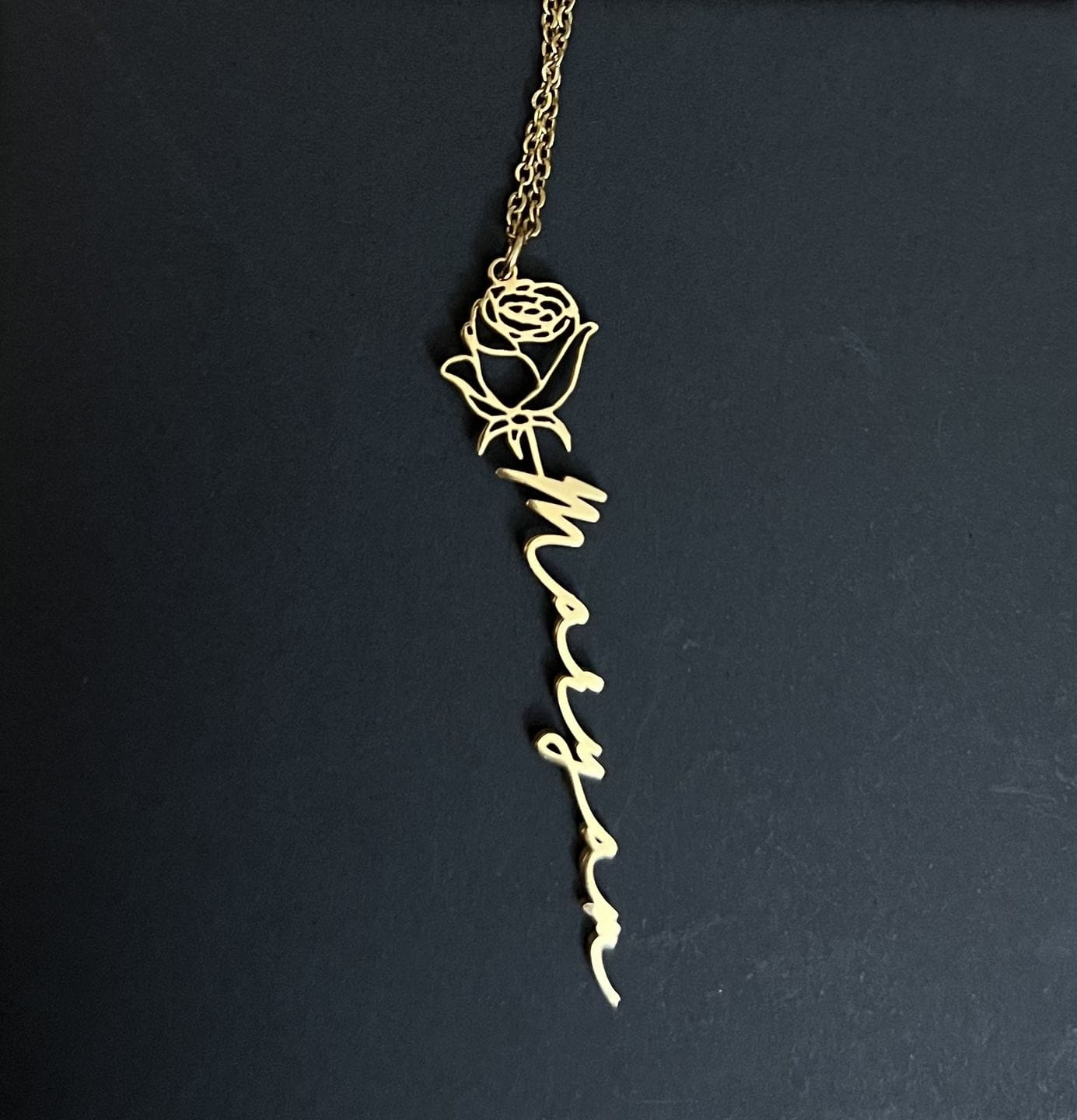 Customer photo review of Custom birth flower name necklace