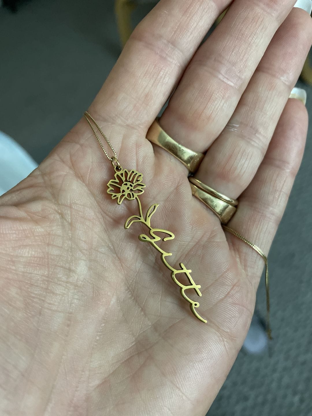 Customer photo review of Custom birth flower name necklace