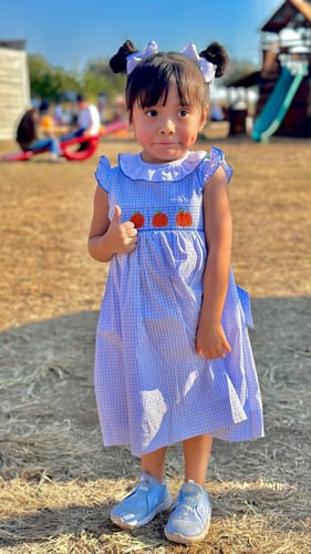 Customer photo review of Pumpkin Cutie Smocked Blue Plaid Ruffle Collared Dress
