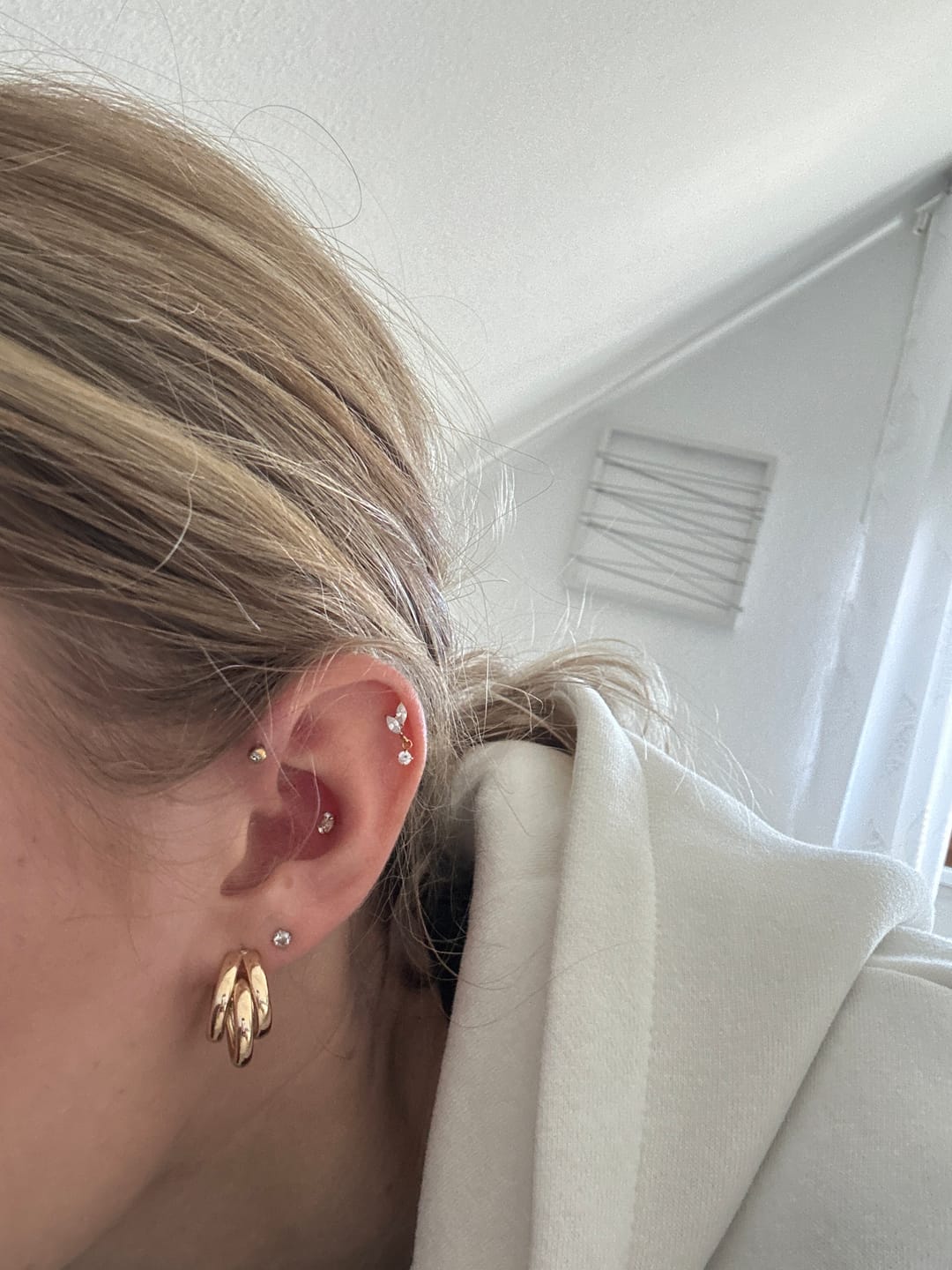Customer photo review of Fleur Piercing | Titan