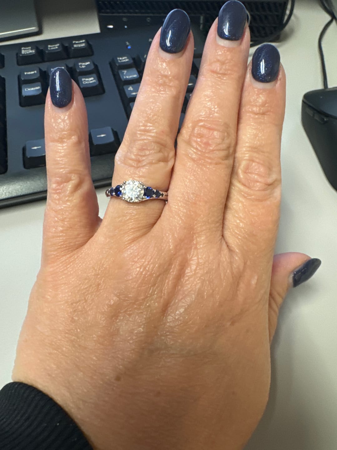 Customer photo review of Seven Stone Moissanite And Blue Sapphire Twisted Rope Engagement Ring
