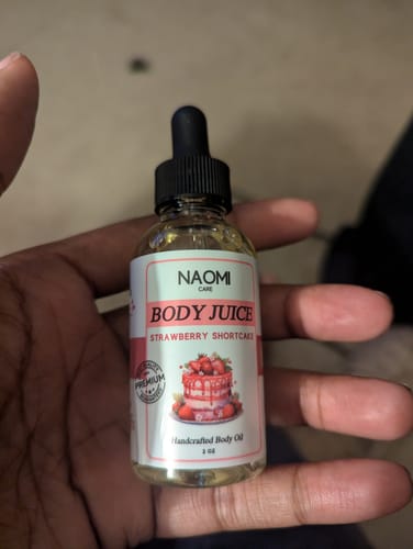 Customer photo review of BOGO Naomi Body Juice Oil