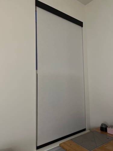 Customer photo review of SmartWings Motorized Light Filtering Roller Shades 70% Blackout Linen