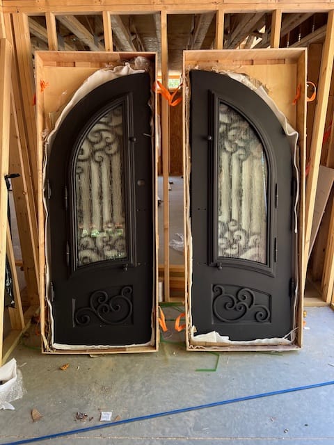 Customer photo review of Conroe Model Double Front Entry Iron Door With Tempered Rain Glass Dark Bronze Finish