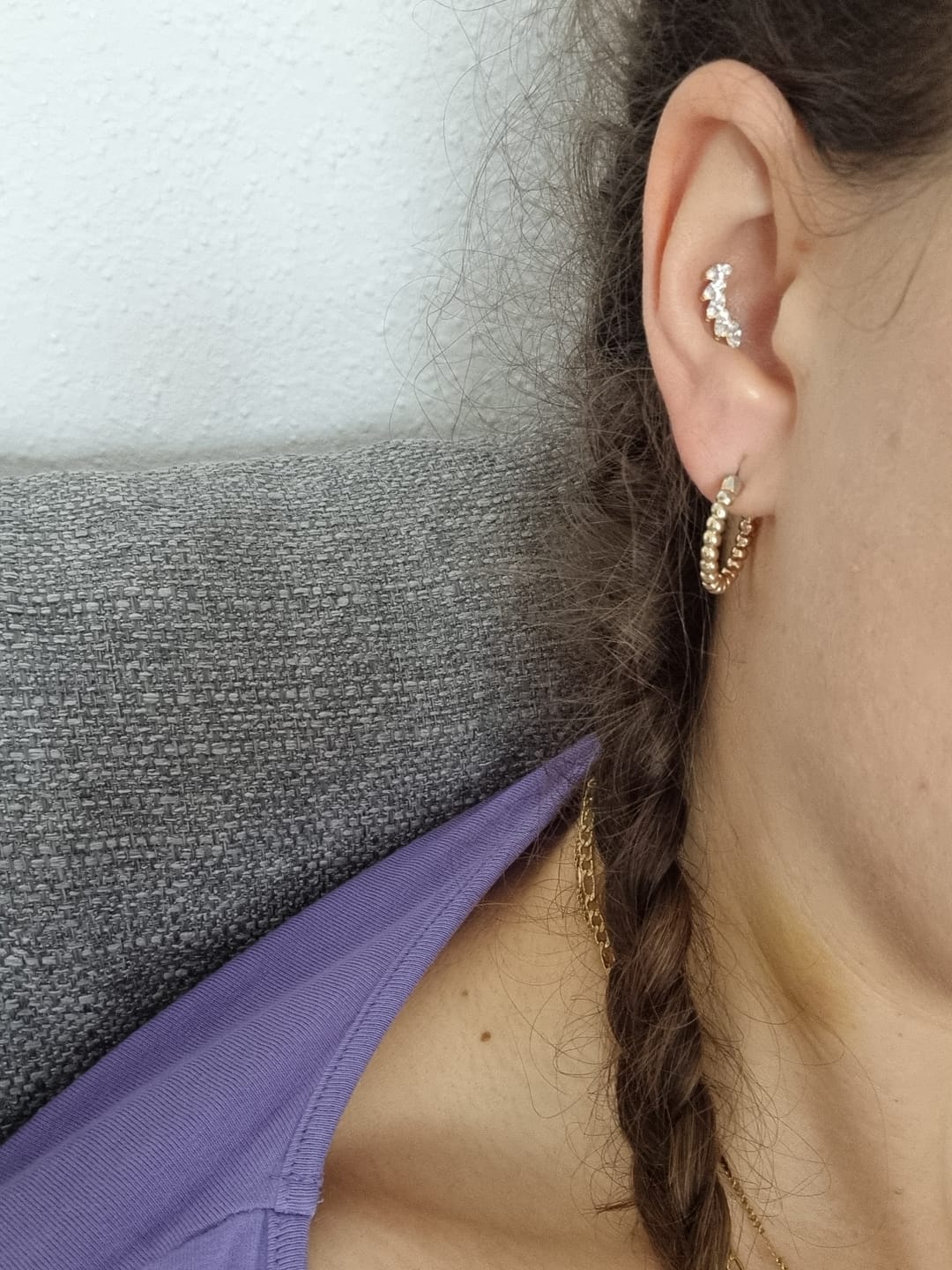 Customer photo review of Feather Piercing | Titan
