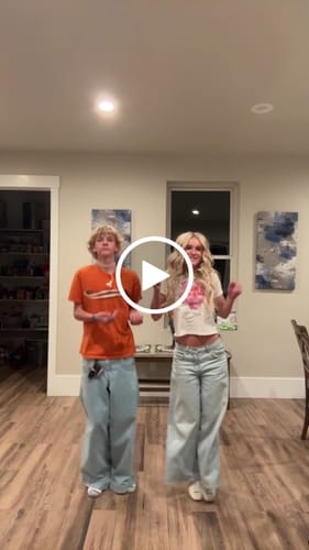 Customer video review of 'Flower Girl' baby tee