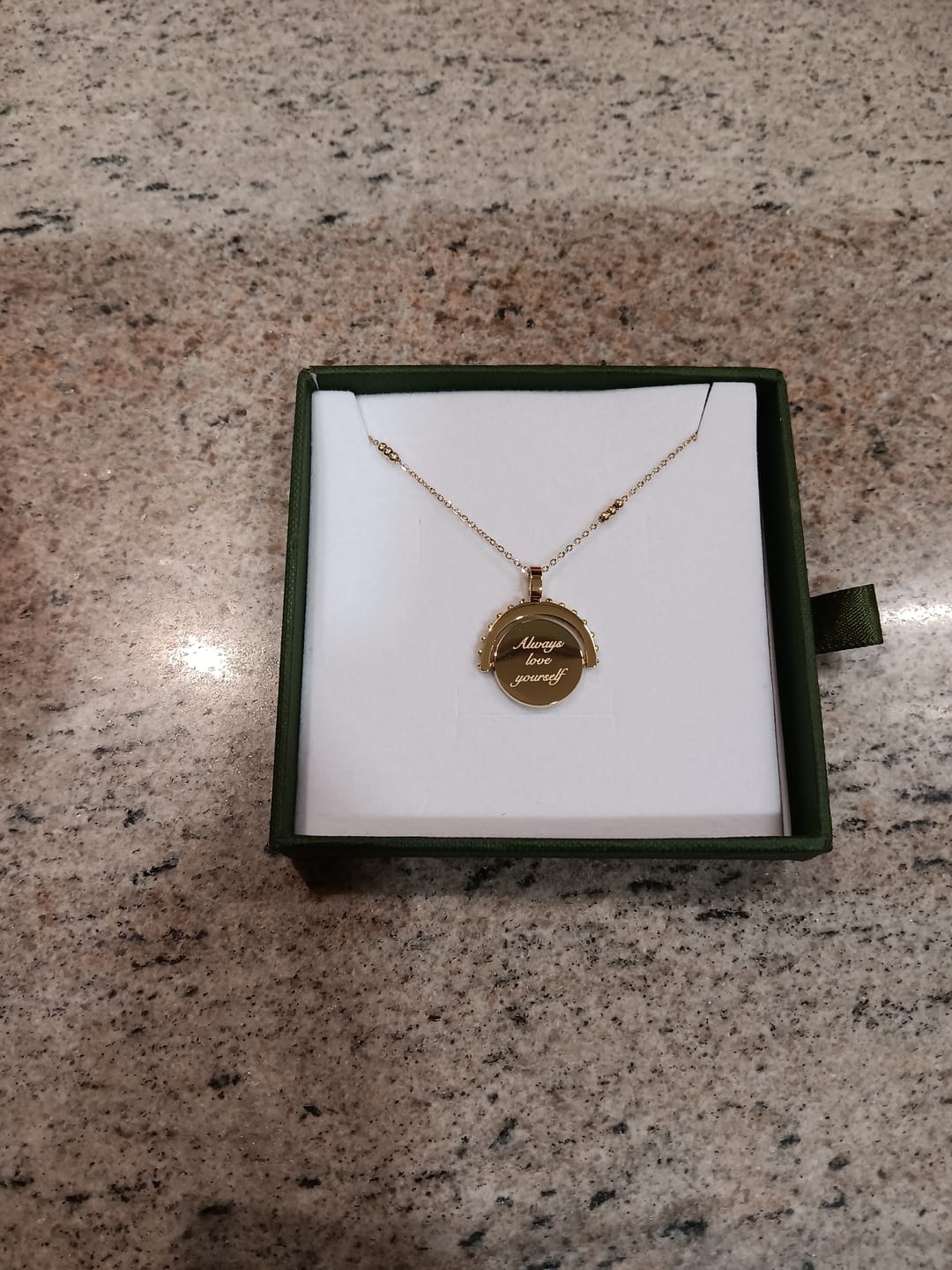 Customer photo review of Engravable Spinning Necklace