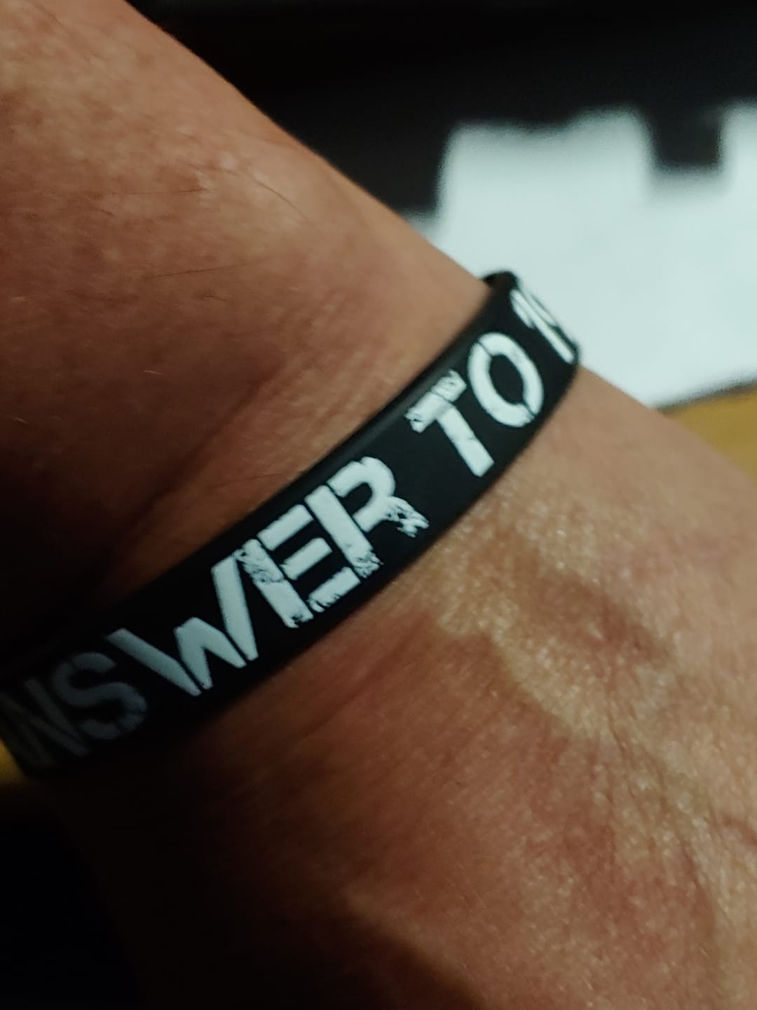 Customer photo review of The Answer to 1984 Wristband
