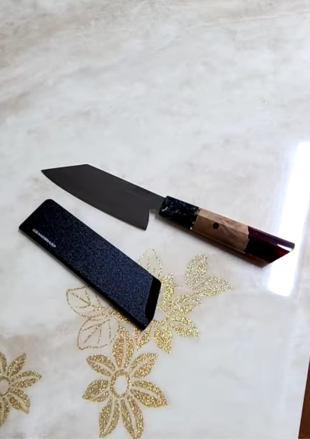 Customer photo review of Kurohana (黒花) - Japanese Damascus Steel Chef's Knife (5.5 inch)
