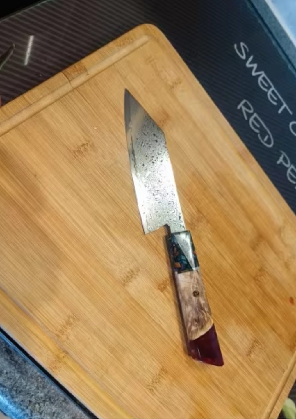 Customer photo review of Kurohana (黒花) - Japanese Damascus Steel Chef's Knife (5.5 inch)