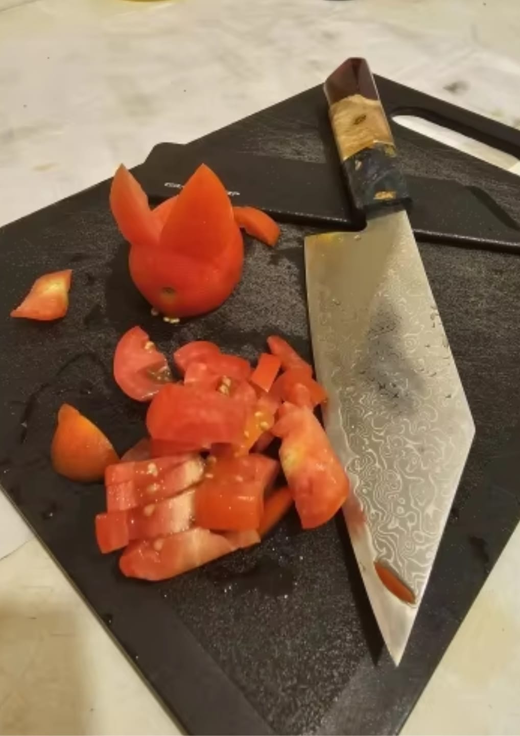 Customer photo review of Kurohana (黒花) - Japanese Damascus Steel Chef's Knife (5.5 inch)