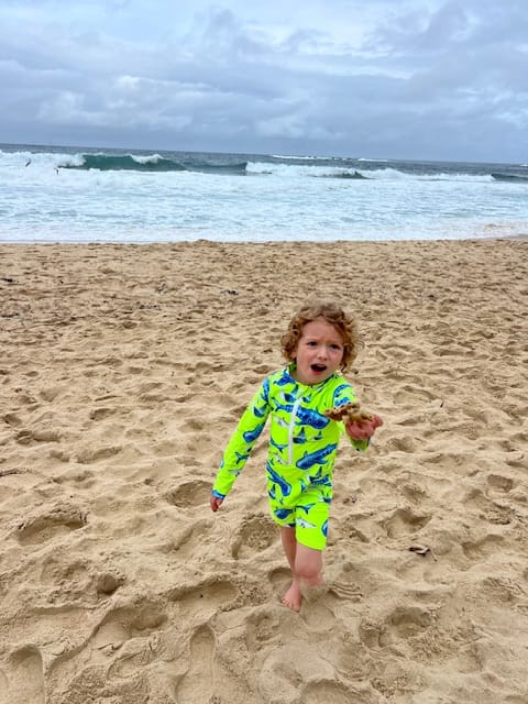 Customer photo review of Fluro Green Sharks Unisex Long Sleeve Zip Swimmers
