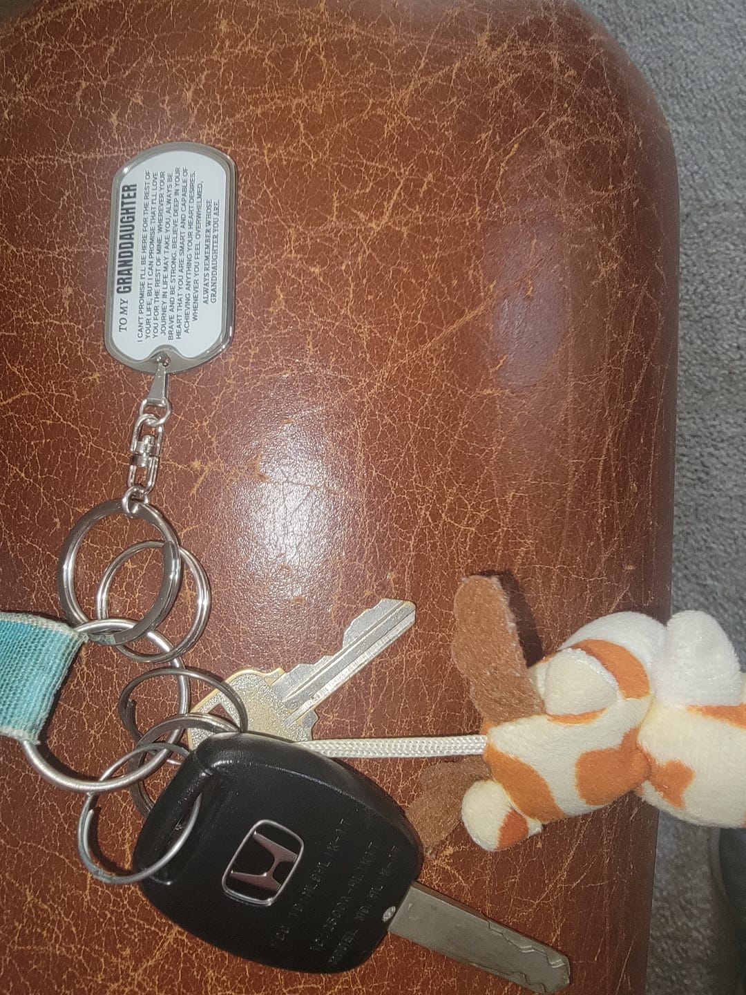 Customer photo review of To My Granddaughter | Remember Whose Granddaughter You Are | Personalized Keychain - SS293GDT