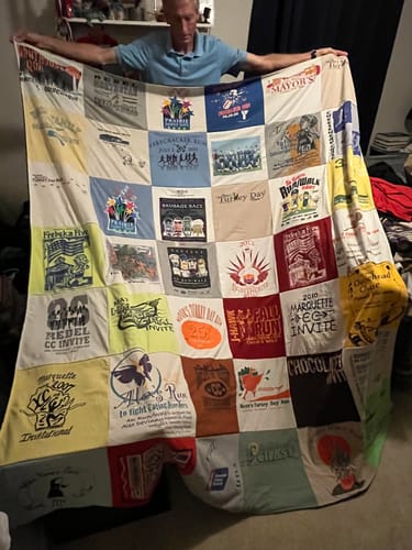 T-shirt quilt featuring rebels cross country team by Deb from WI