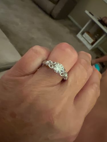 Kim M. review of Vintage Three Stone Moissanite Scrollwork Engagement Ring image 1 out of 1