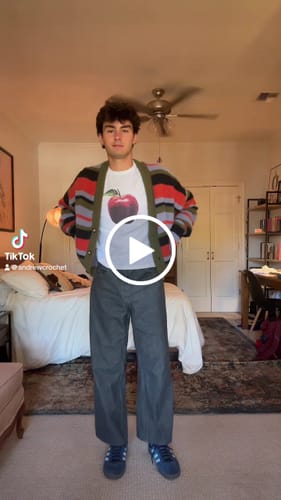 Customer video review of 'Rotten' premium baby tee