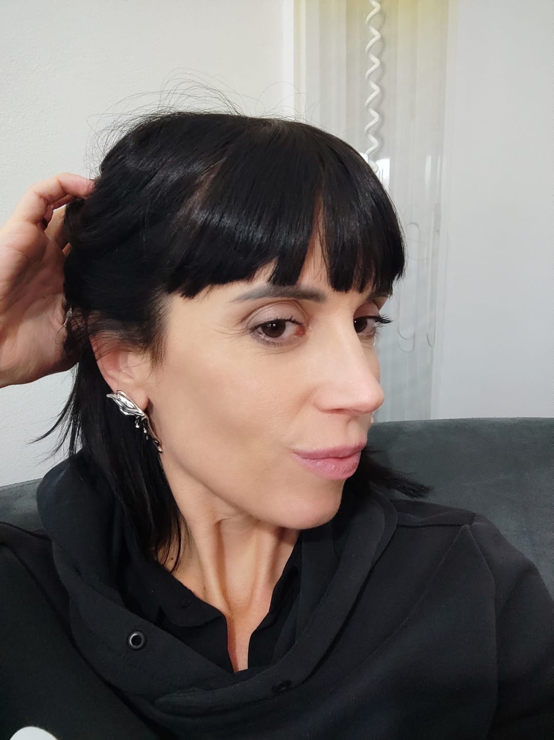 Customer photo review of ORECCHINI “FARFALLA”