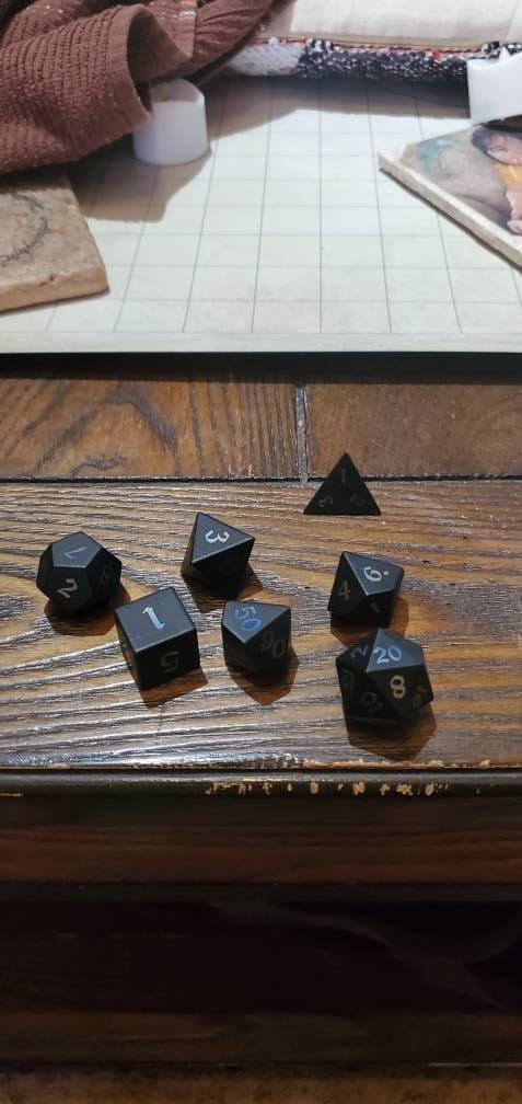 Customer photo review of Inked Black Night Raised Obsidian Hand Carved Dice (And Box) DND Set