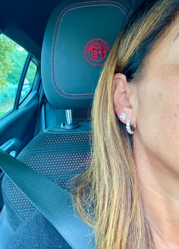 Customer photo review of MOISSANITE LOTUS FLOWER STUDS. - WHITE GOLD