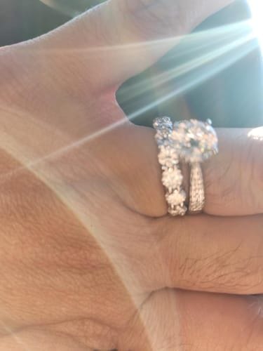 Customer photo review of Coralia 0.5Ct Moissanite 925 Sterling Silver Eternity Band Ring