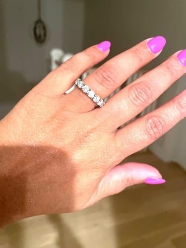 Customer photo review of Coralia 0.5Ct Moissanite 925 Sterling Silver Eternity Band Ring