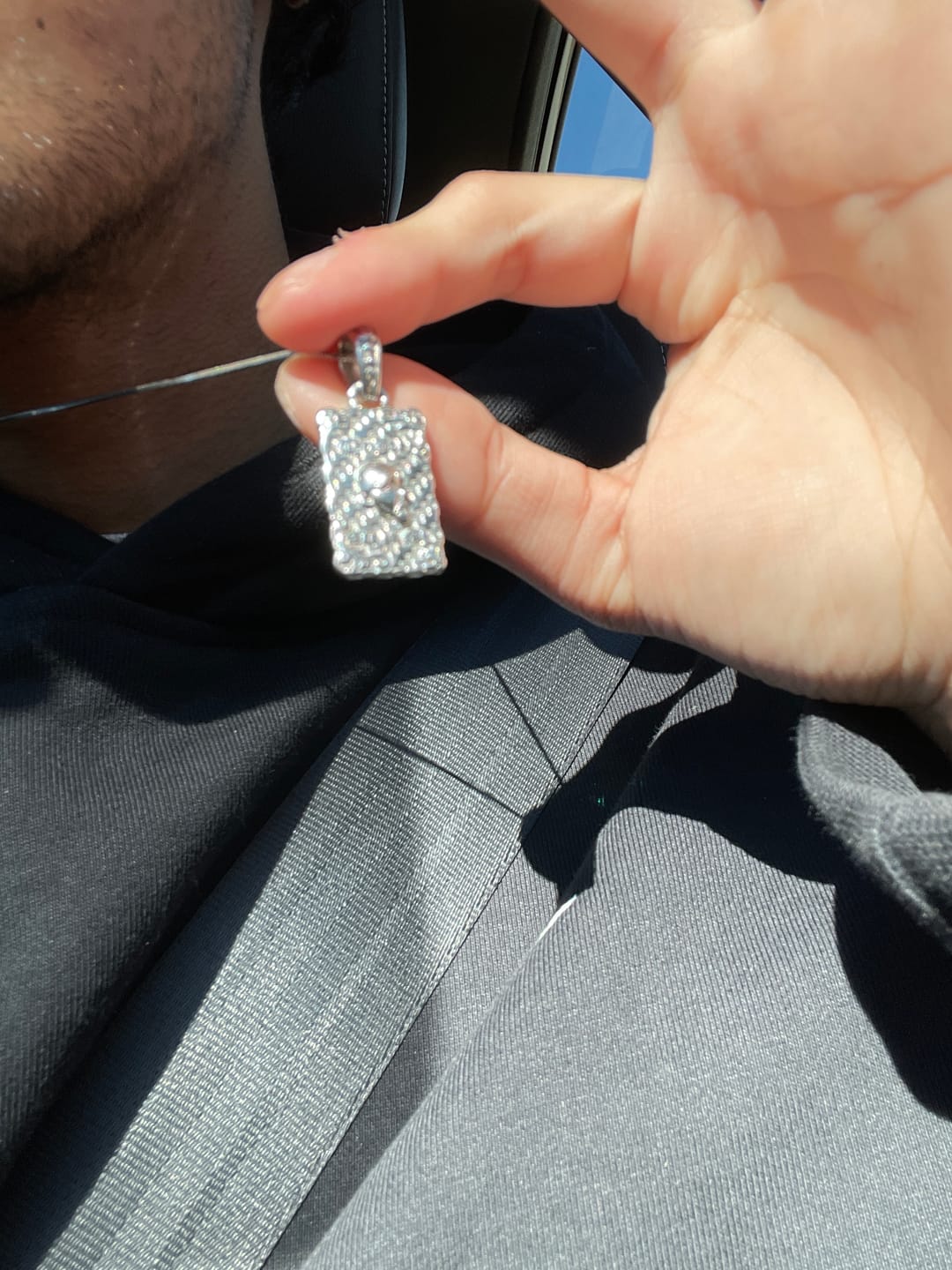 Customer photo review of LAUGH NOW, DIE LATER PENDANT