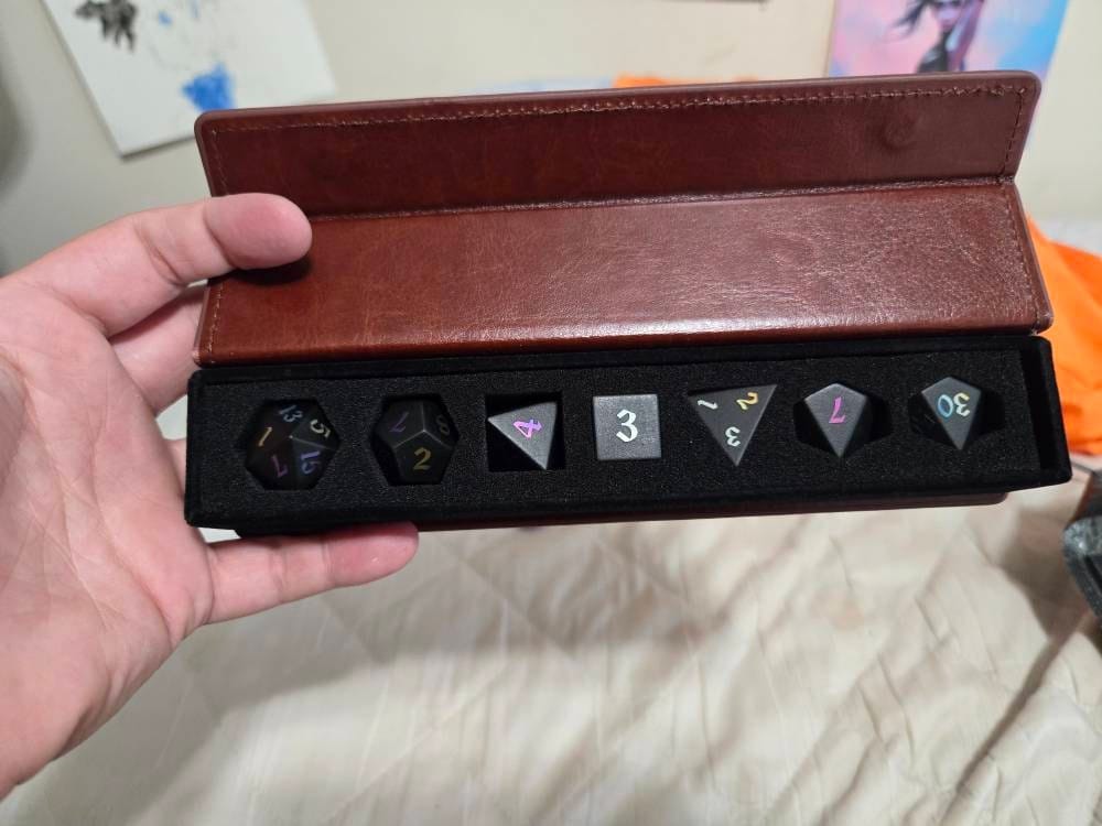Customer photo review of Inked Black Night Raised Obsidian Hand Carved Dice (And Box) DND Set