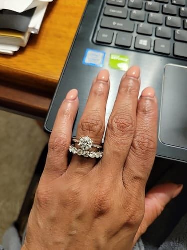 Customer photo review of Coralia 0.5Ct Moissanite 925 Sterling Silver Eternity Band Ring
