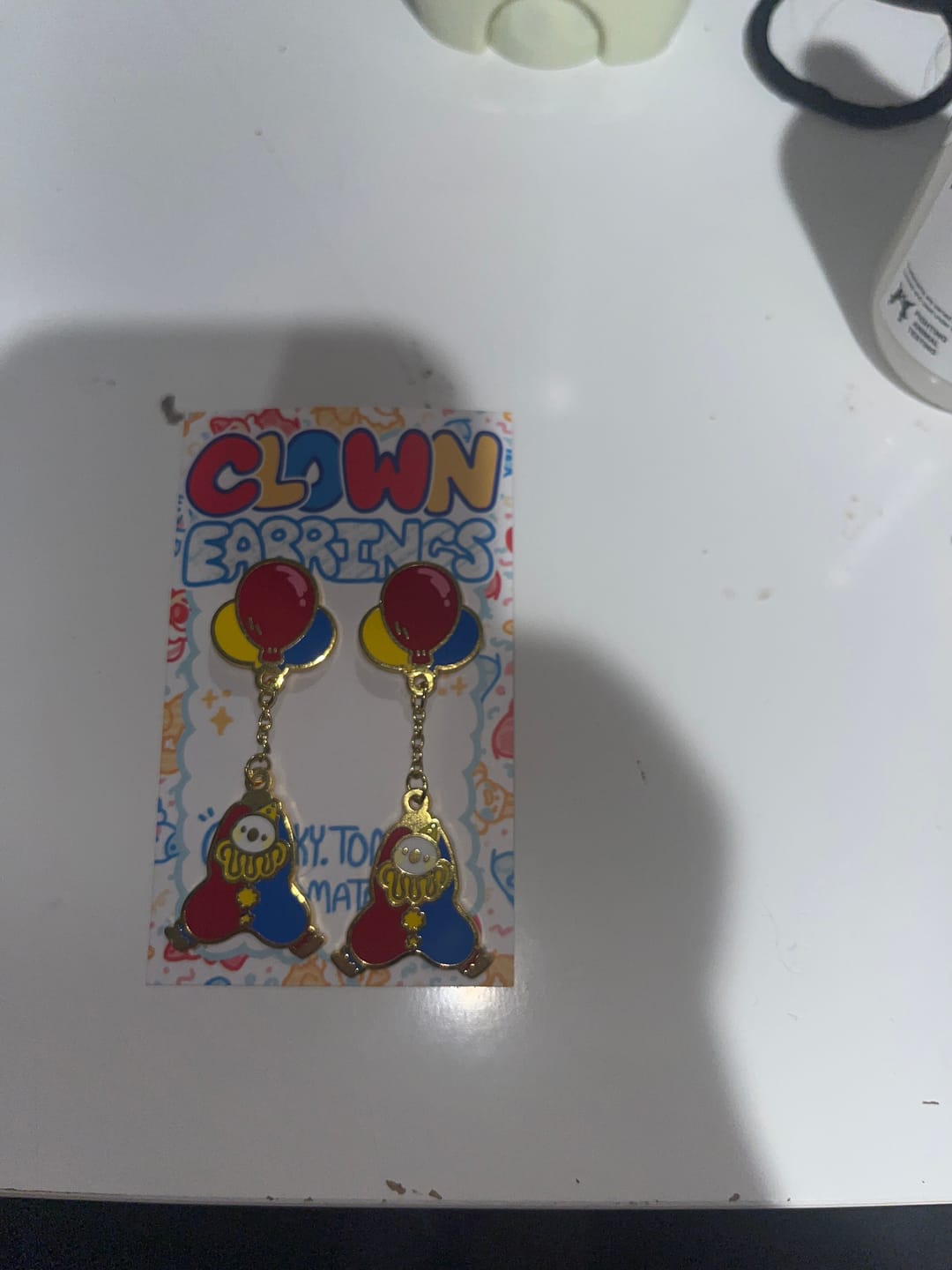 Customer photo review of Dangling Clown Earrings