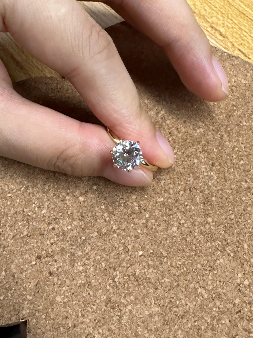Customer photo review of S925 Moissanite/ Simulated Diamond 2.0 Carat Round Cut Solitaire Engagement Ring In Sterling Silver