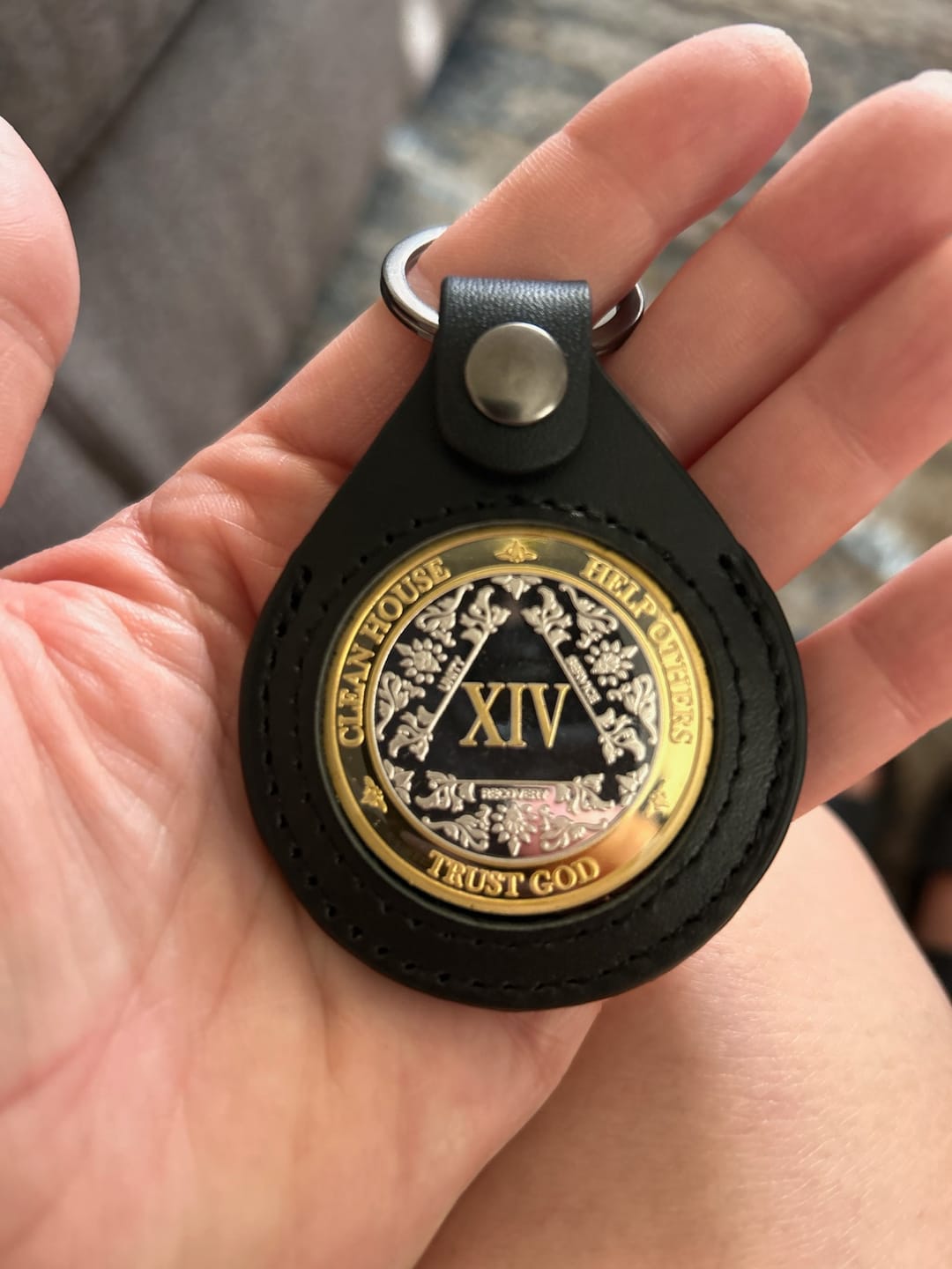 Customer photo review of Sobriety Mint Genuine Leather 40mm AA Medallion Keychain Holder - Recovery Chip/Coin/Token Holder - Black