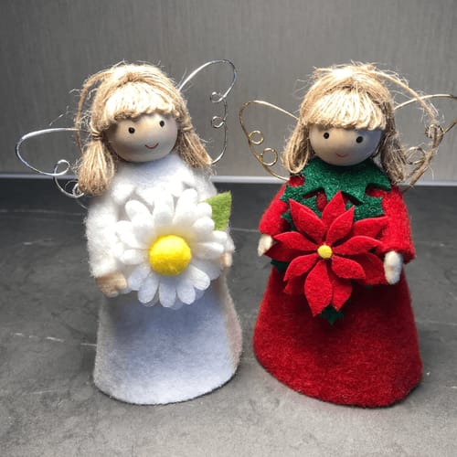 Customer photo review of Flower angels - daisy for hope & poinsettia for joy