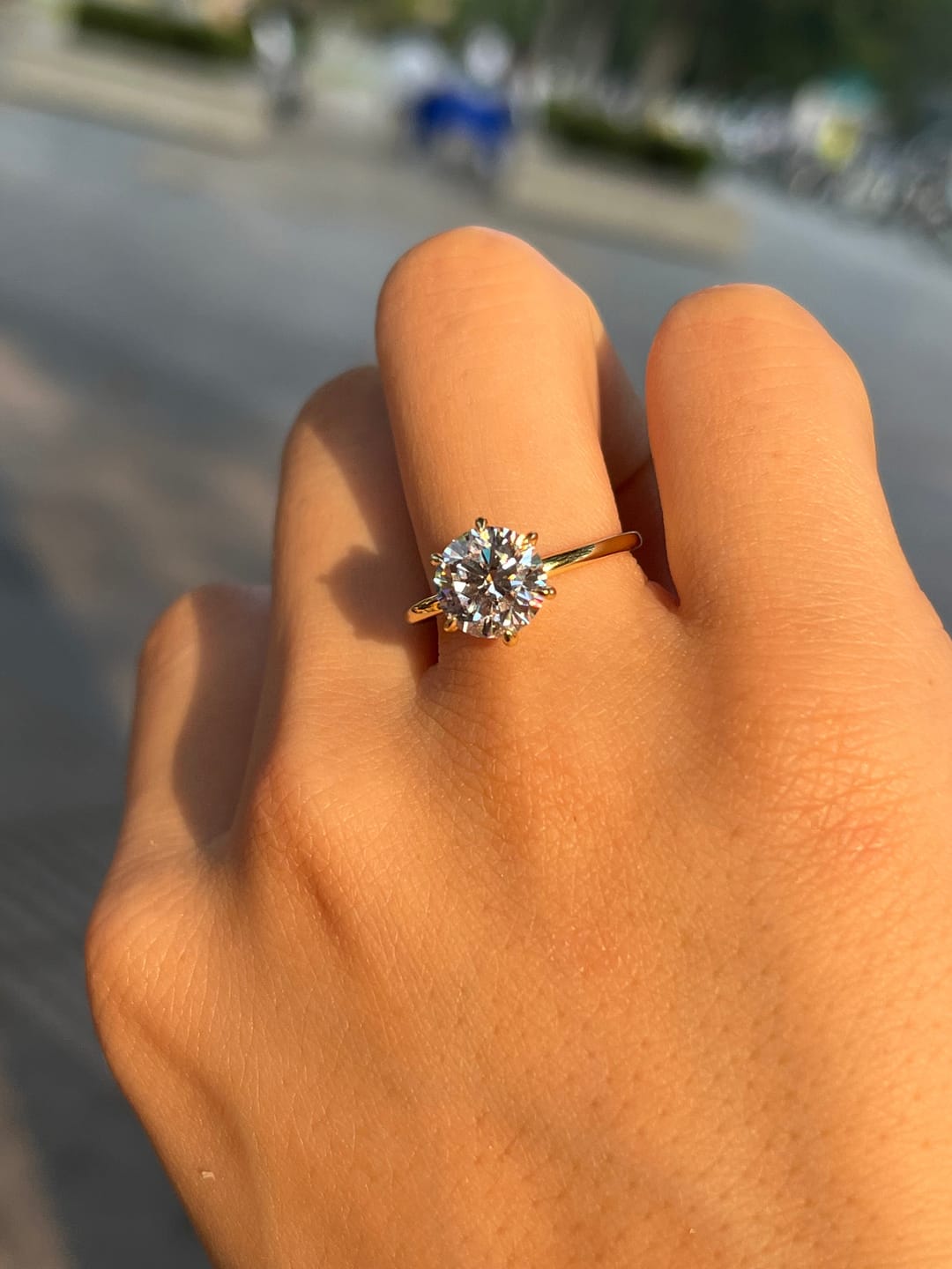 Customer photo review of S925 Moissanite/ Simulated Diamond 2.0 Carat Round Cut Solitaire Engagement Ring In Sterling Silver