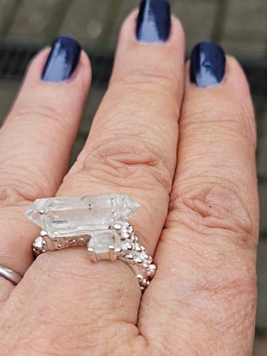 Customer photo review of Healing Through Balance Clear Quartz Rings