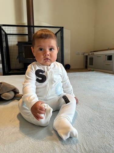 Customer photo review of Soll Wooley Zip Bodysuit - Multi Blue