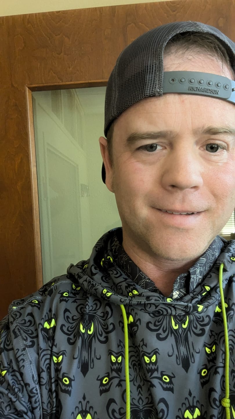 Customer photo review of Disney’s Haunted Mansion "Wall Creeps" – Performance Hoodie