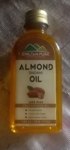 Customer photo review of Sweet Almond Oil – Treats Acne, Dark Spots & Damaged Scalp