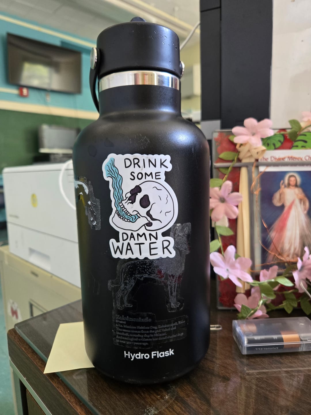 Customer photo review of "Drink some damn water" skull sticker
