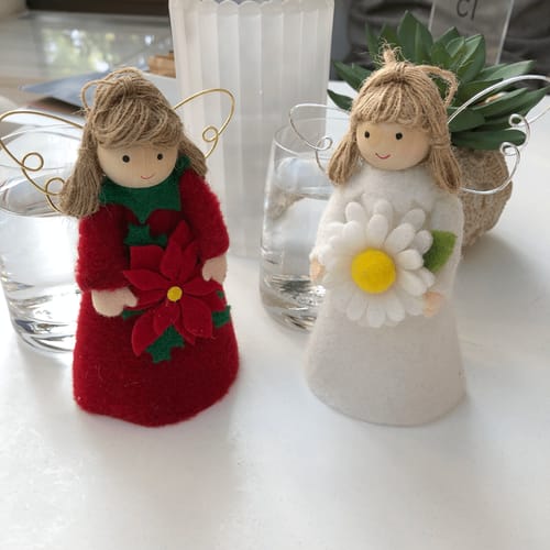 Customer photo review of Flower angels - daisy for hope & poinsettia for joy