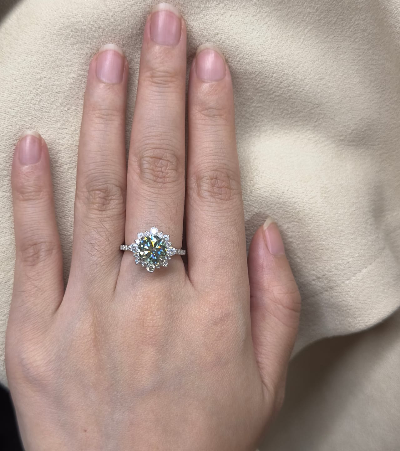 Customer photo review of S925 Moissanite 2 Ct Snowflake Design Halo Round Cyan Blue Stone Engagement Ring