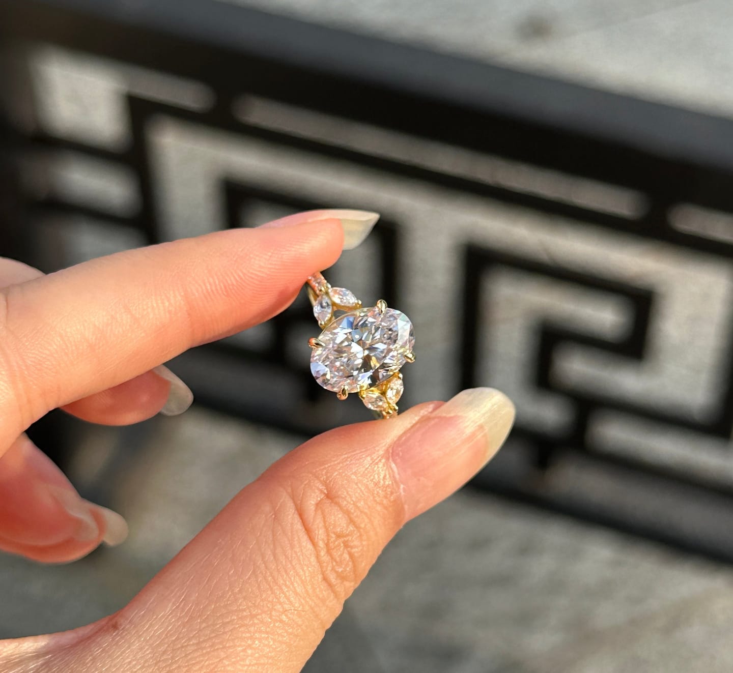 Customer photo review of Louily Sparkle Five Stone Yellow Gold Oval Cut Engagement Ring In Sterling Silver