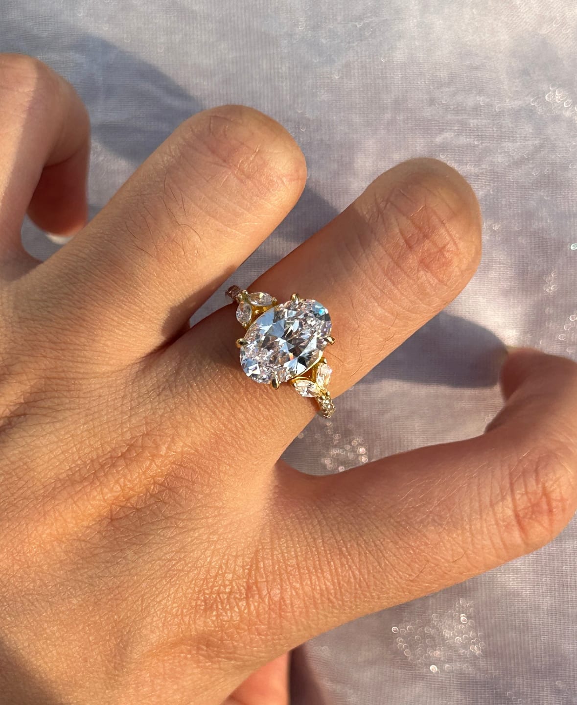 Customer photo review of Louily Sparkle Five Stone Yellow Gold Oval Cut Engagement Ring In Sterling Silver