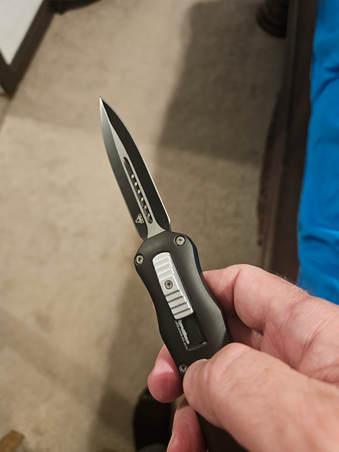Customer photo review of Black Reaper OTF Knife