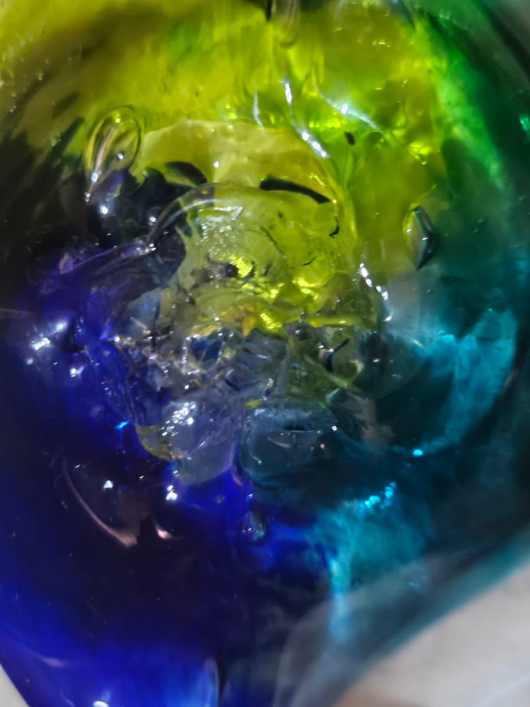 Customer photo review of Dichroic Spinner Suncatcher with Infused Cremains