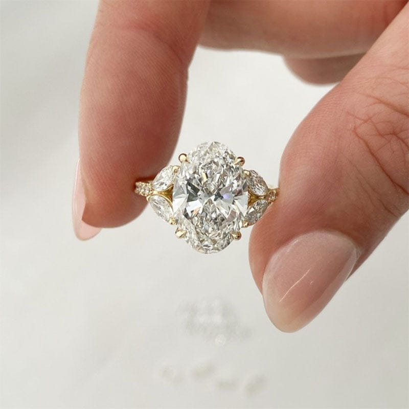 Customer photo review of Louily Sparkle Five Stone Yellow Gold Oval Cut Engagement Ring In Sterling Silver