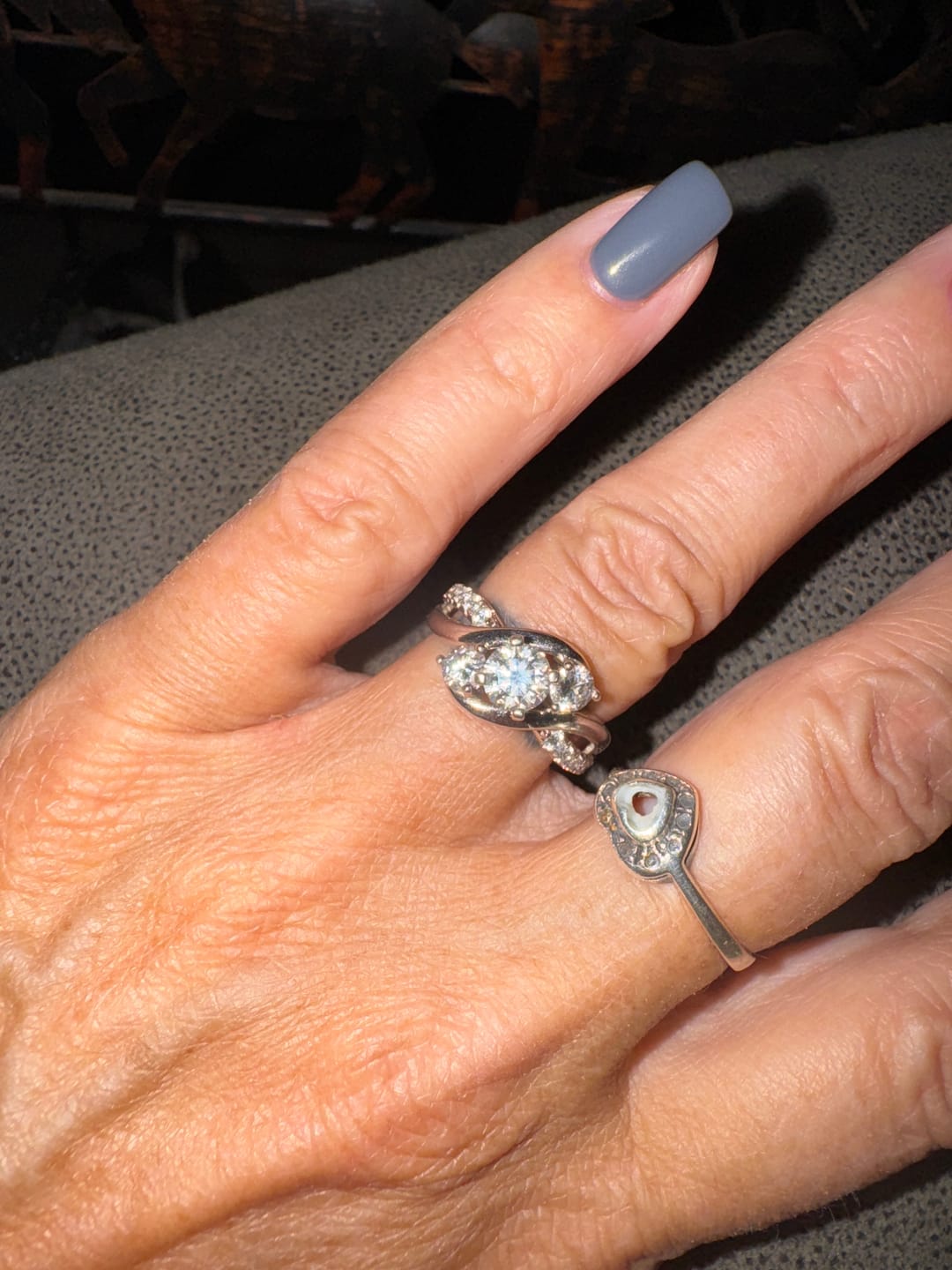 Customer photo review of Swirl Three Stone Moissanite Twisted Pave Engagement Ring