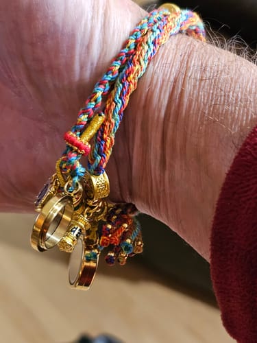 Customer photo review of Buddha Stones Tibet Handmade Five Color Thread Protection Braid String Bracelet