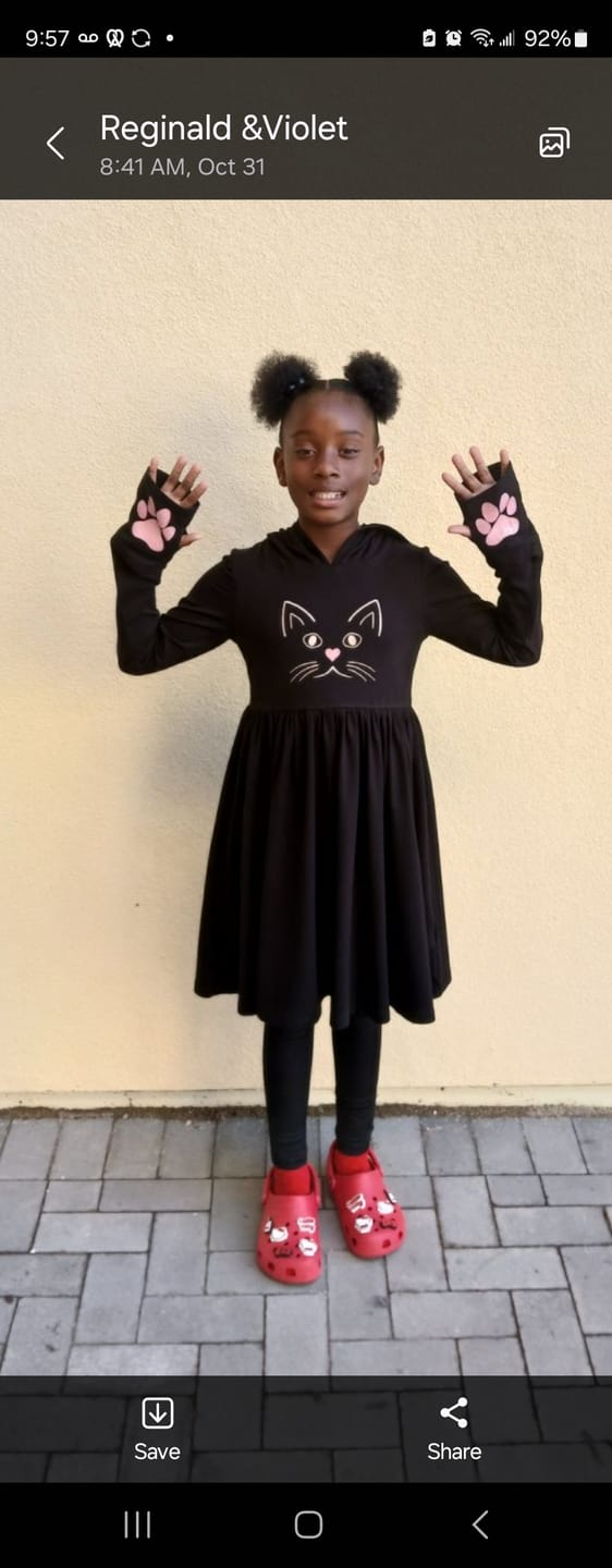 Customer photo review of Black Kitty Twirl Dress with Paws